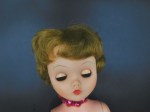 tall jointed vinyl doll red face a